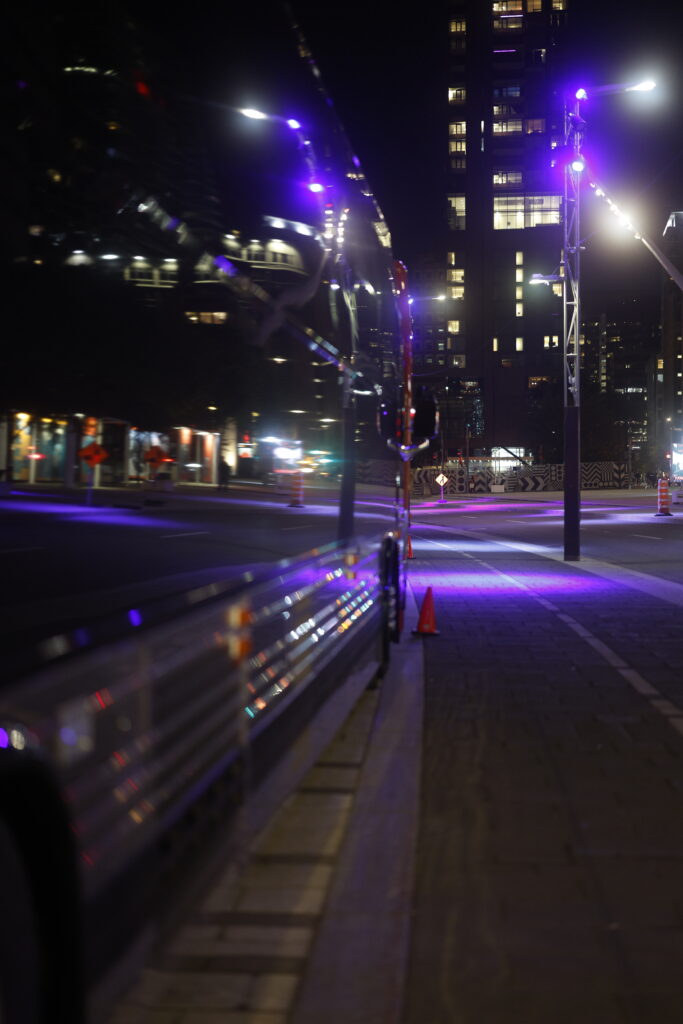 Shot on boulevard De Maisonneuve using the Canon R5 Mark II, with RF 50mm f1.2 L USM lens, at f1.2 aperture, shutter speed of 1/100s, ISO 1600, B+W 1/4 black mist filter.